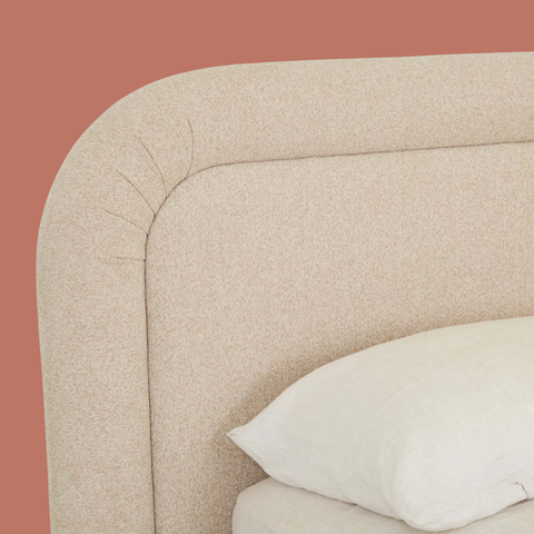 Alexis curved bed ivory boucle, front view showing tubular headboard