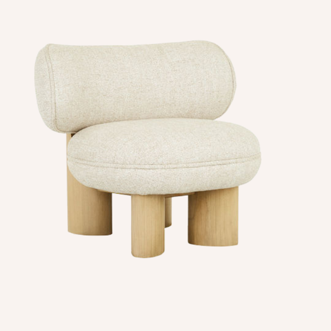 Arturo Vanilla occasional chair with puffed rounded silhouette and dark chestnut mindi wood legs, front view