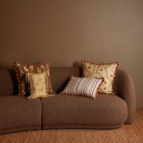 Bauhaus Buff Linen Cushion styled on a sofa