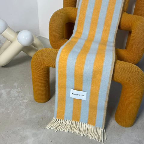 Blue Honey Blanket styled in a living room