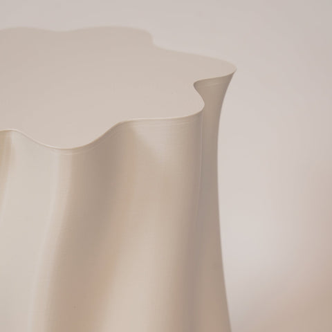 Close-up of eggshell finish and ergonomic form on the Lulu stool
