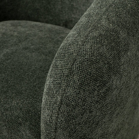 Close-up of green textured polyester fabric on the Ted swivel chair