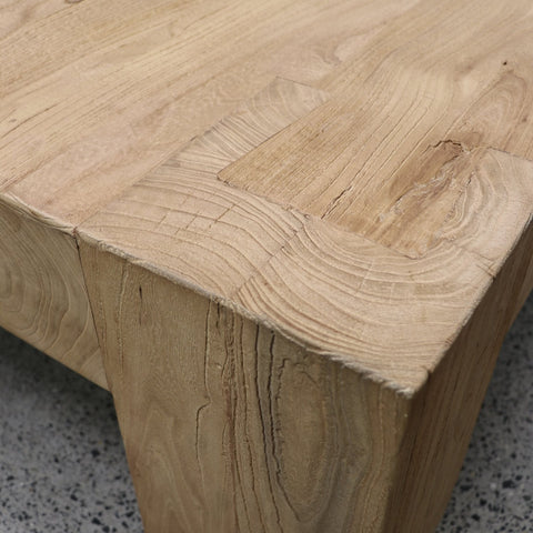 Close-up of handcrafted dovetail corner joint on the Lodge reclaimed elm coffee table