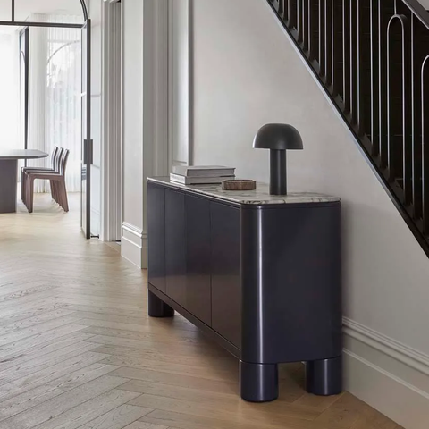 Close-up of marble veining and glossy finish on the Maven sideboard, navy colourway