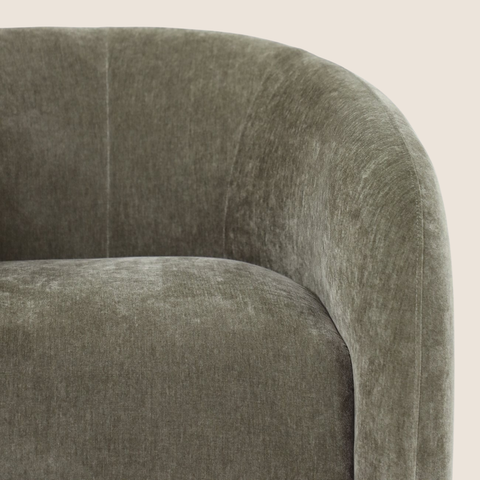 Close-up of moss textured polyester fabric on the Ted swivel chair