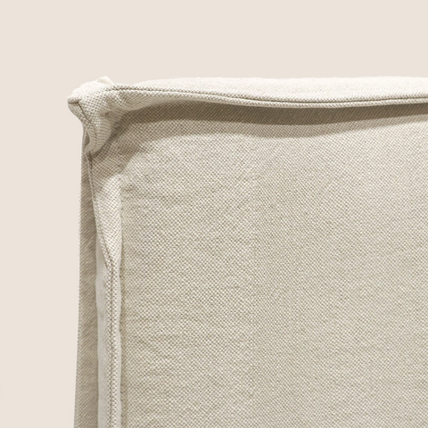 Close-up of oatmeal upholstery texture on the Harry headboard
