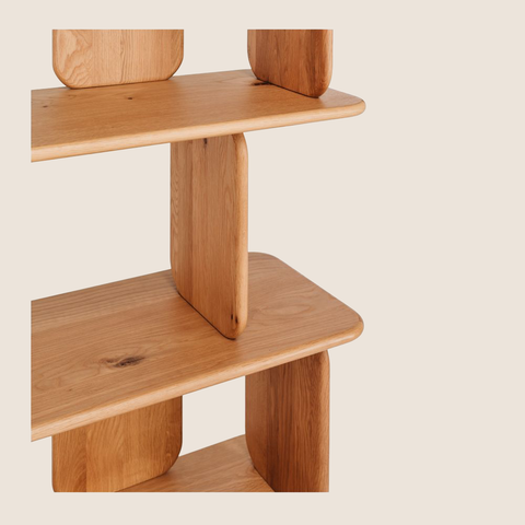 Close-up of pill-shaped support and oak grain detail on the Kensho bookcase