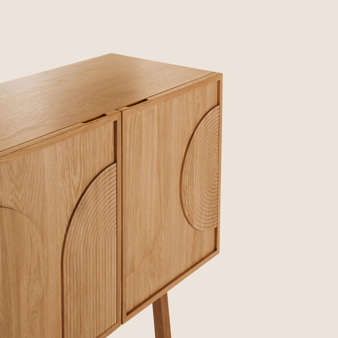 Close-up of sculpted circular panel door detail on the Modern Ritual Sideboard