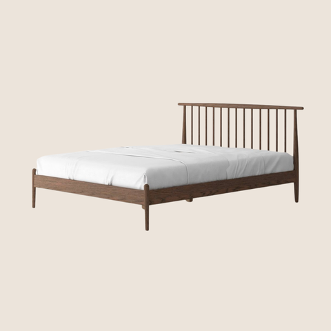 Close-up of slatted headboard detail and oak grain on the Havenwood bed frame