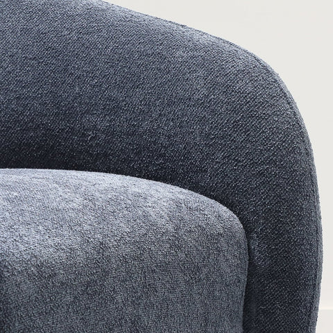 Close-up of steel grey textured polyester fabric on the Ted swivel chair