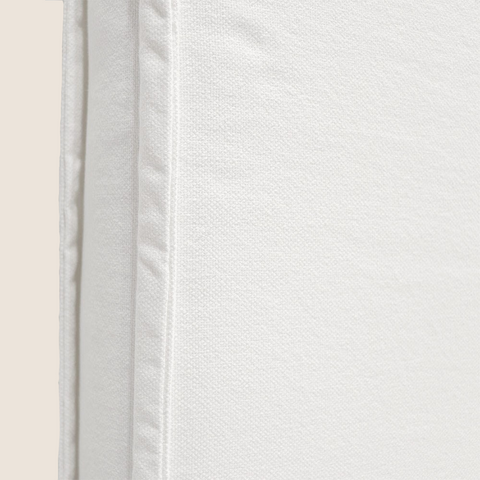 Close-up of white cotton upholstery texture on the Harry headboard