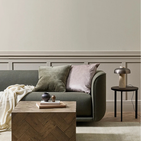 Edward Thyme Cushion styled in a living room setting