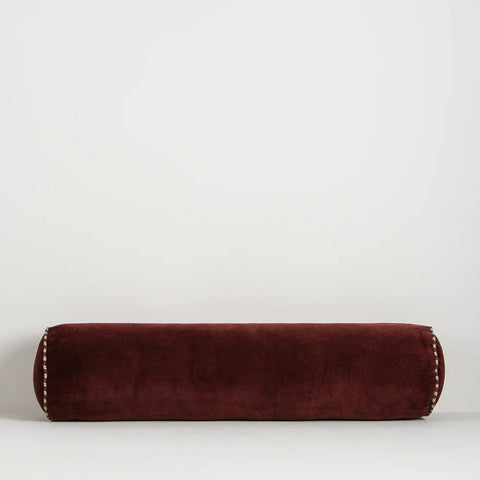 Elliot Bolster Cushion in Oxblood cotton velvet with striped linen piped ends