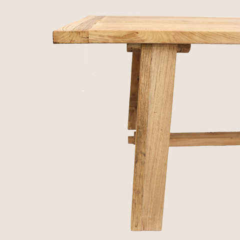 Gia dining table alternate angle showing leg clearance and tabletop depth