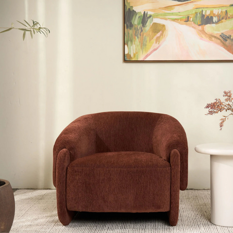 Haven Armchair, front view showing curved silhouette