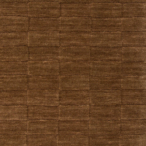 Hugo Toffee rug close-up showing hand-carved checkerboard pile depth