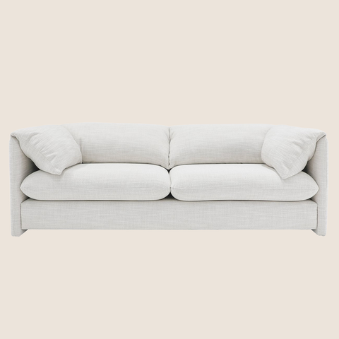 Ishi sofa styled in a contemporary living room, limestone fabric