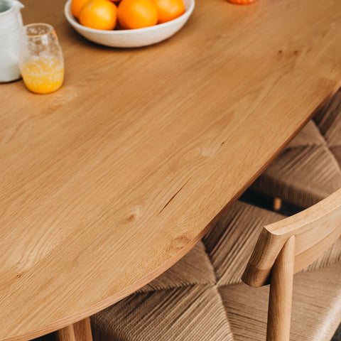 Johnny dining table styled in a dining room, alternate lifestyle shot