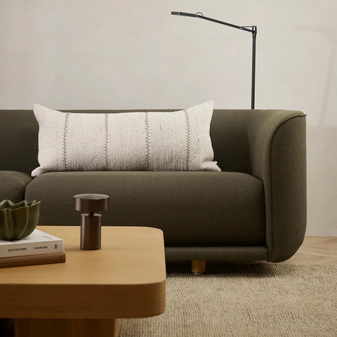 Kalahari Cushion styled on a sofa showing the textural weave