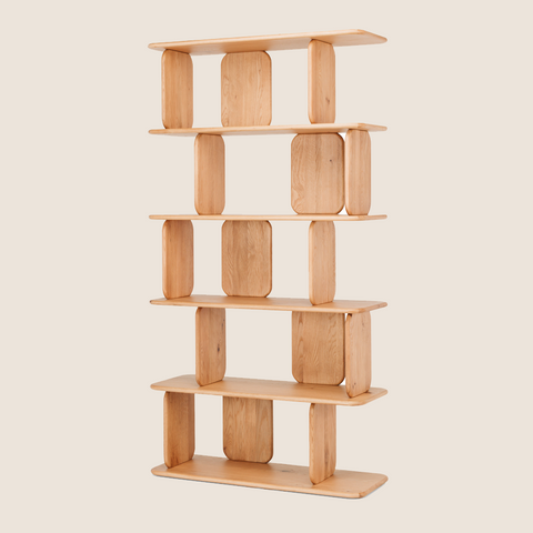 Kensho Tall sculptural solid oak bookcase with pill-shaped supports, full view