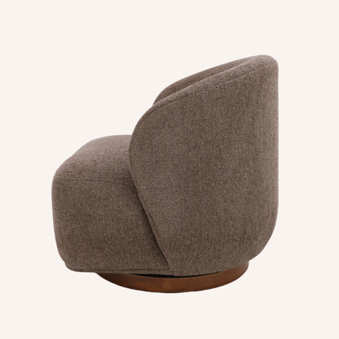 Koora Swivel Chair side view showing curved wraparound back