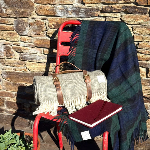 Leather Throw Straps styled on a red chair