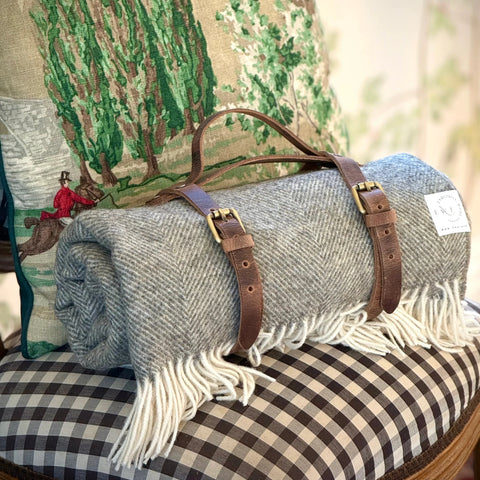 Leather Throw Straps styled on a seat
