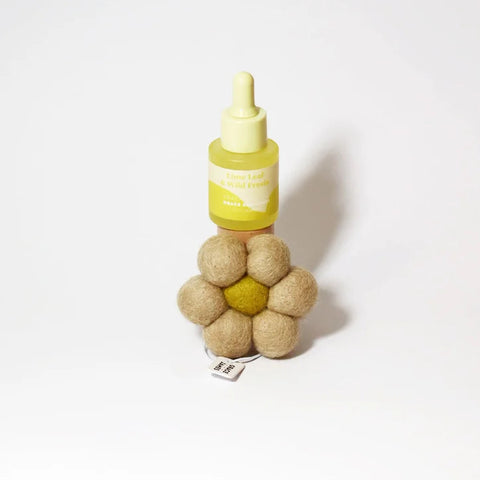 Lime Leaf & Fresia fragrance dropper bottle with felt flower diffuser