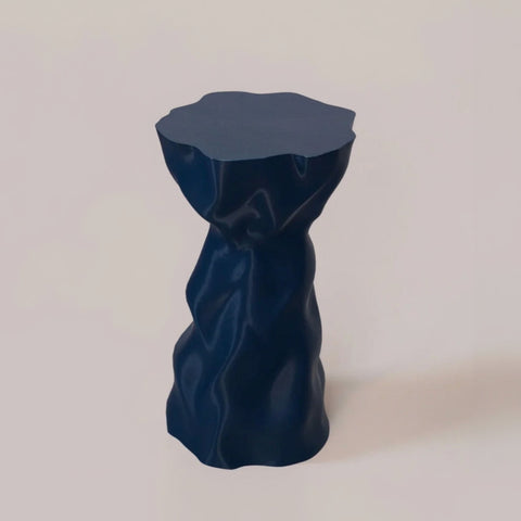 Lulu Noise navy recycled plastic side table with wavy surface texture