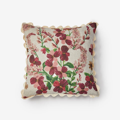 Lupin Multi Linen Cushion, Floral patterned pillow with scalloped edge on a white background