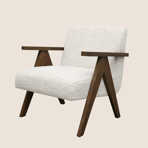 Madison mid-century style armchair, side view showing structured form and timber legs