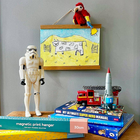 Magnetic print frame displaying kids' artwork — unique gift idea