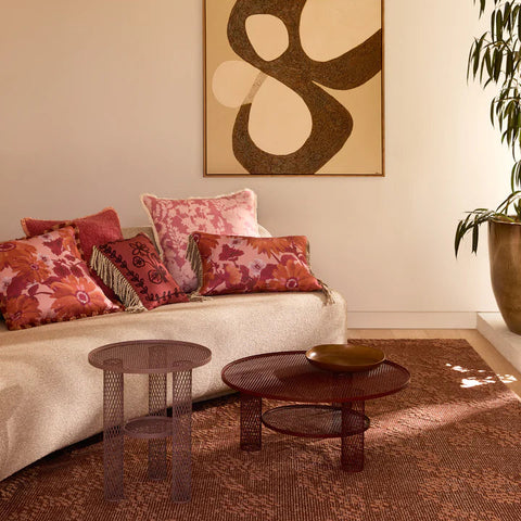 Marigold Rose Linen Cushion styled on a sofa