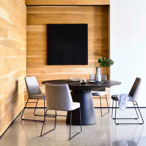 Matthew dining table matt dark oak round, styled in a dining room