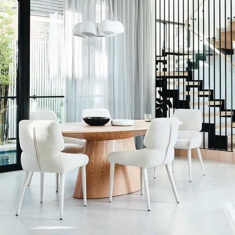 Matthew dining table natural ash veneer, styled in a dining room setting