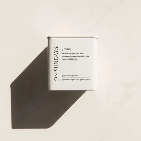 Product packaging with 'On Sundays' branding on a neutral background
