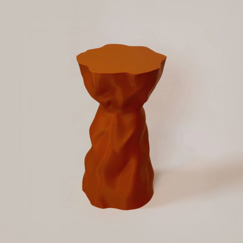 Noise burnt orange recycled plastic side table with wavy surface texture