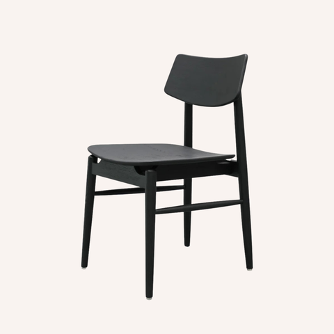 Oslo dining chair in black finish, side profile showing contoured seat