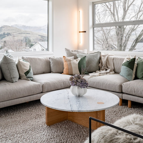 Pivot natural oak coffee table styled in a living room setting