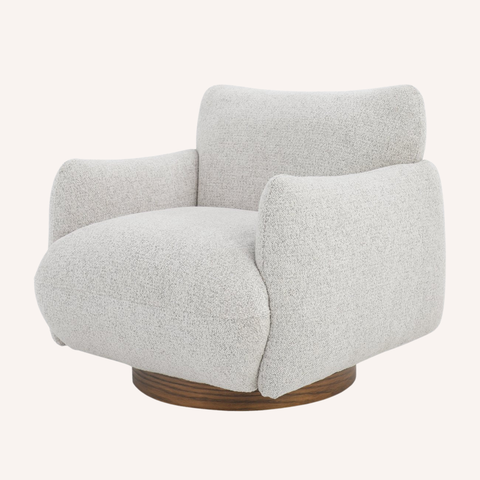 Gray upholstered armchair with wooden base on a white background