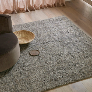 Shale Rug styled in a room setting, grey wool blend