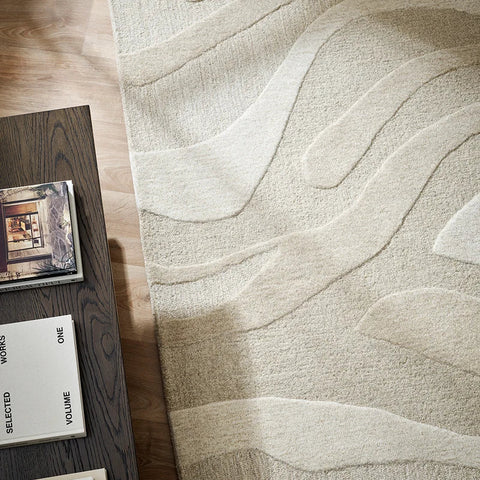 Shoreline Rug in sandy tone styled in a living room setting