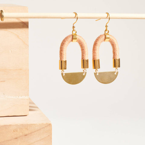 Shortened Earrings worn