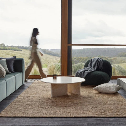Suffolk Natural jute rug styled in a living room setting