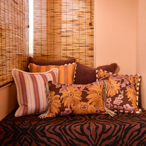Suiting Stripe Coralie Linen Cushion styled on a sofa