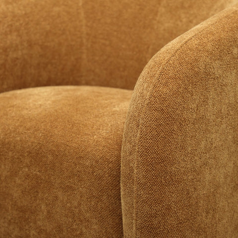 Ted swivel chair ginger, alternate angle showing curved form and tapered arms