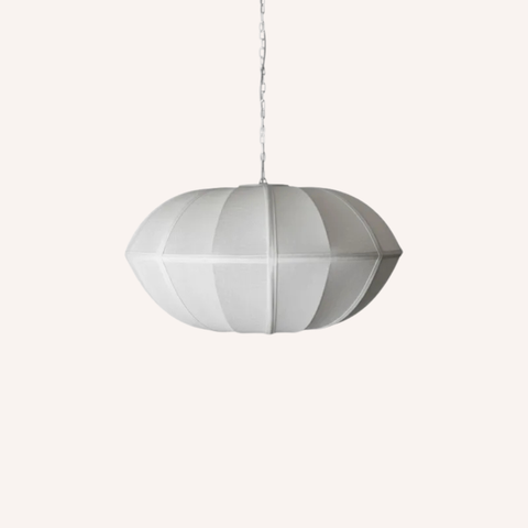 Geometric pendant light with a white geometric design on a white background