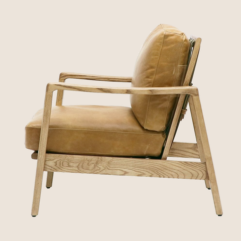 Wanaka Armchair in Tan Leather, side view showing backrest strap detail