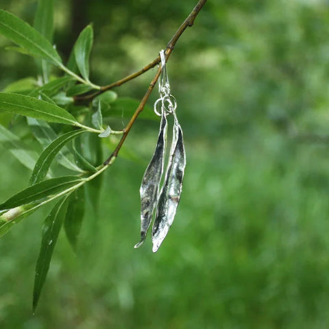 Willow Leaf Earrings styled on ear