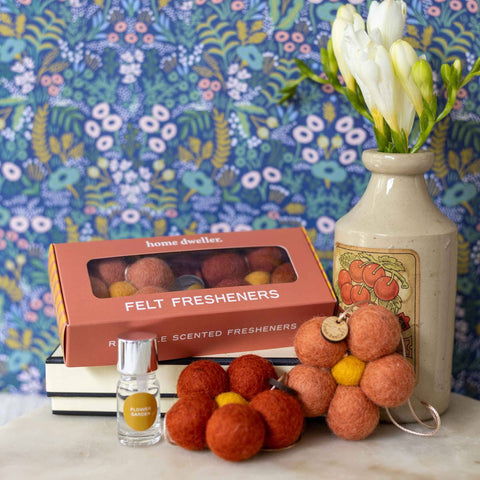 Wool bloom air freshener styled in a bathroom — floral scent diffuser